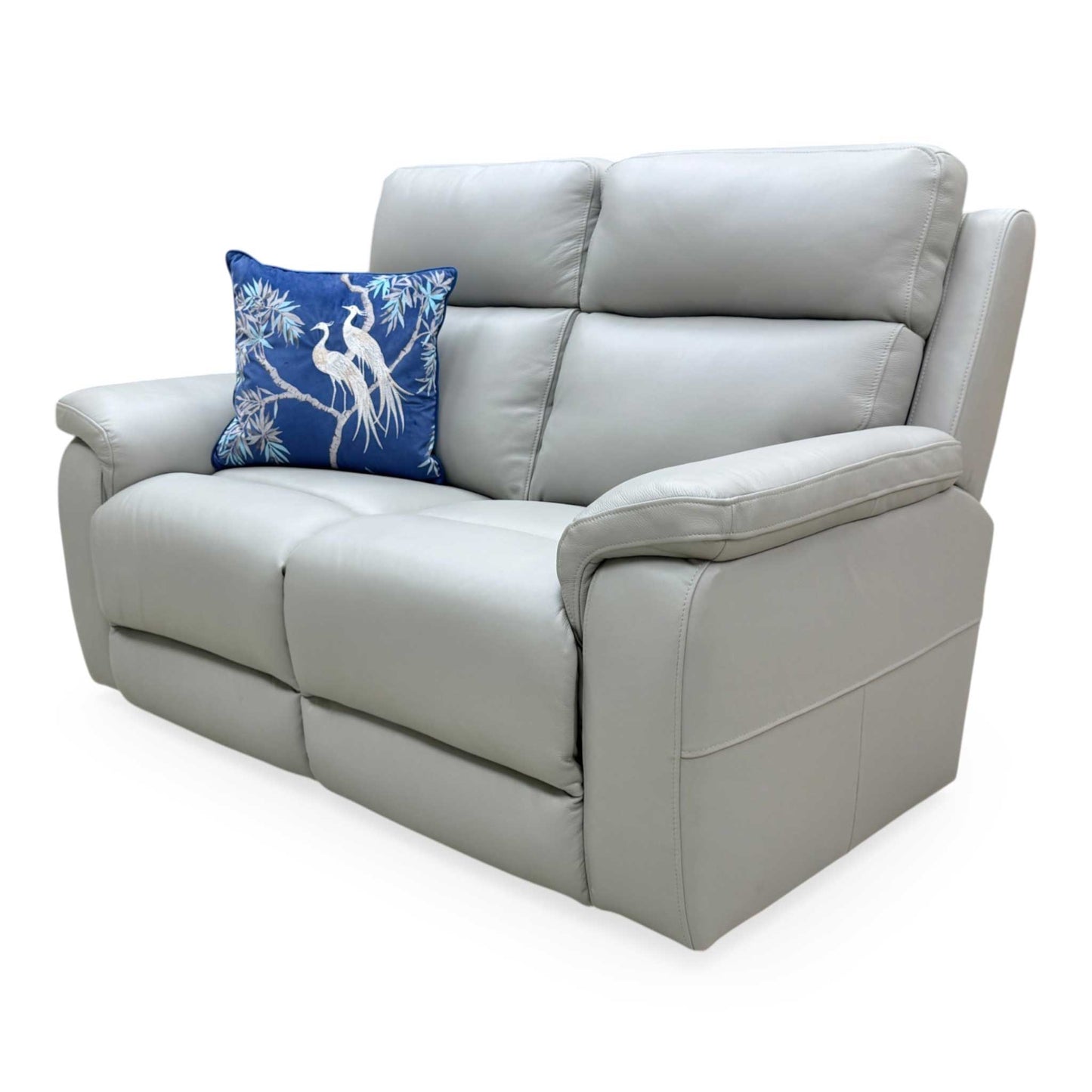 Side profile of the Raven sofa, showing the ergonomic high-back design and curved armrests.