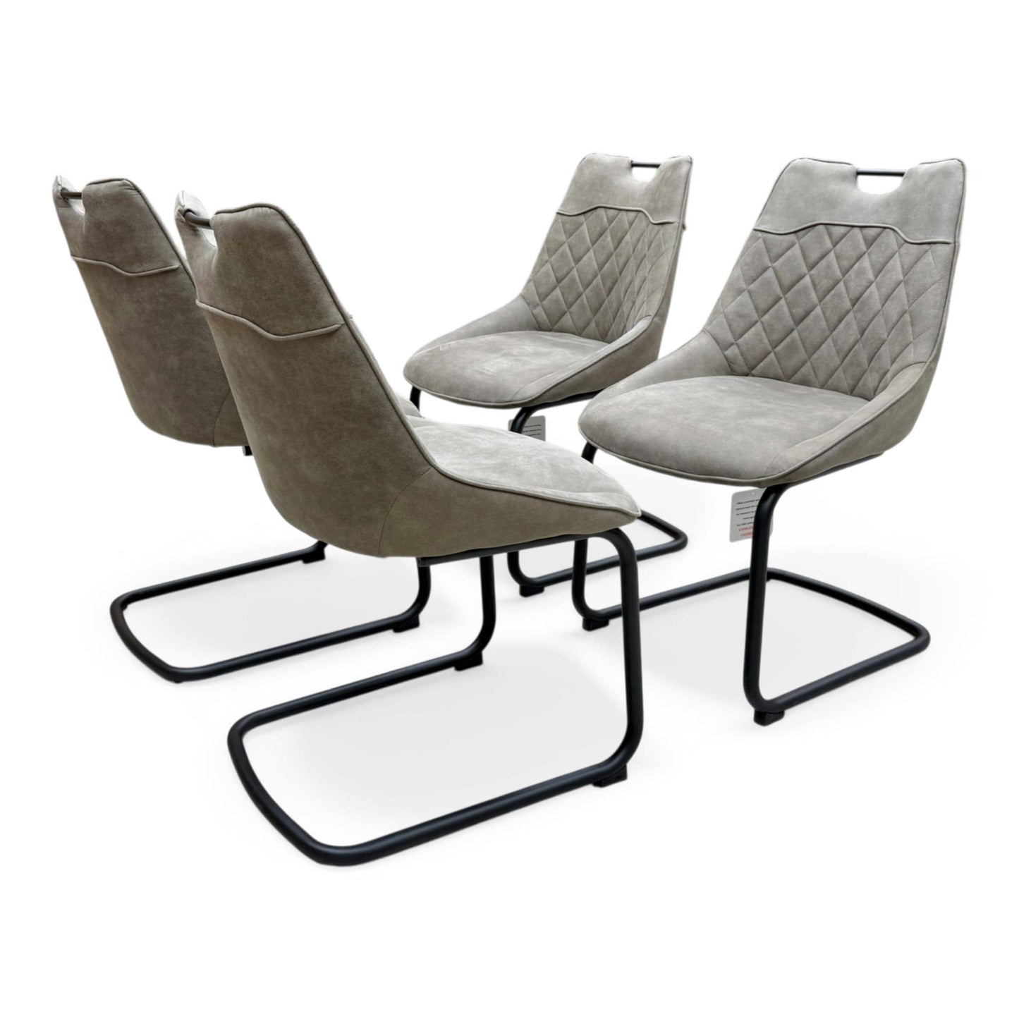 Side view showing the modern C-shaped cantilever silhouette and the sleek black finish of the metal legs.