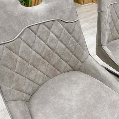 Close up view of the chair's rear design, showcasing the seamless fabric finish and sturdy frame construction.