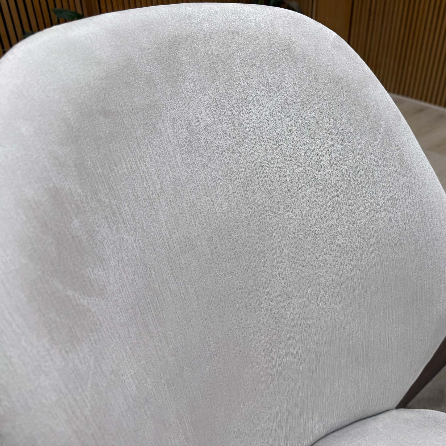 Close up shot of the water-repellent Satin Light Grey fabric, perfect for stain protection in busy dining environments.