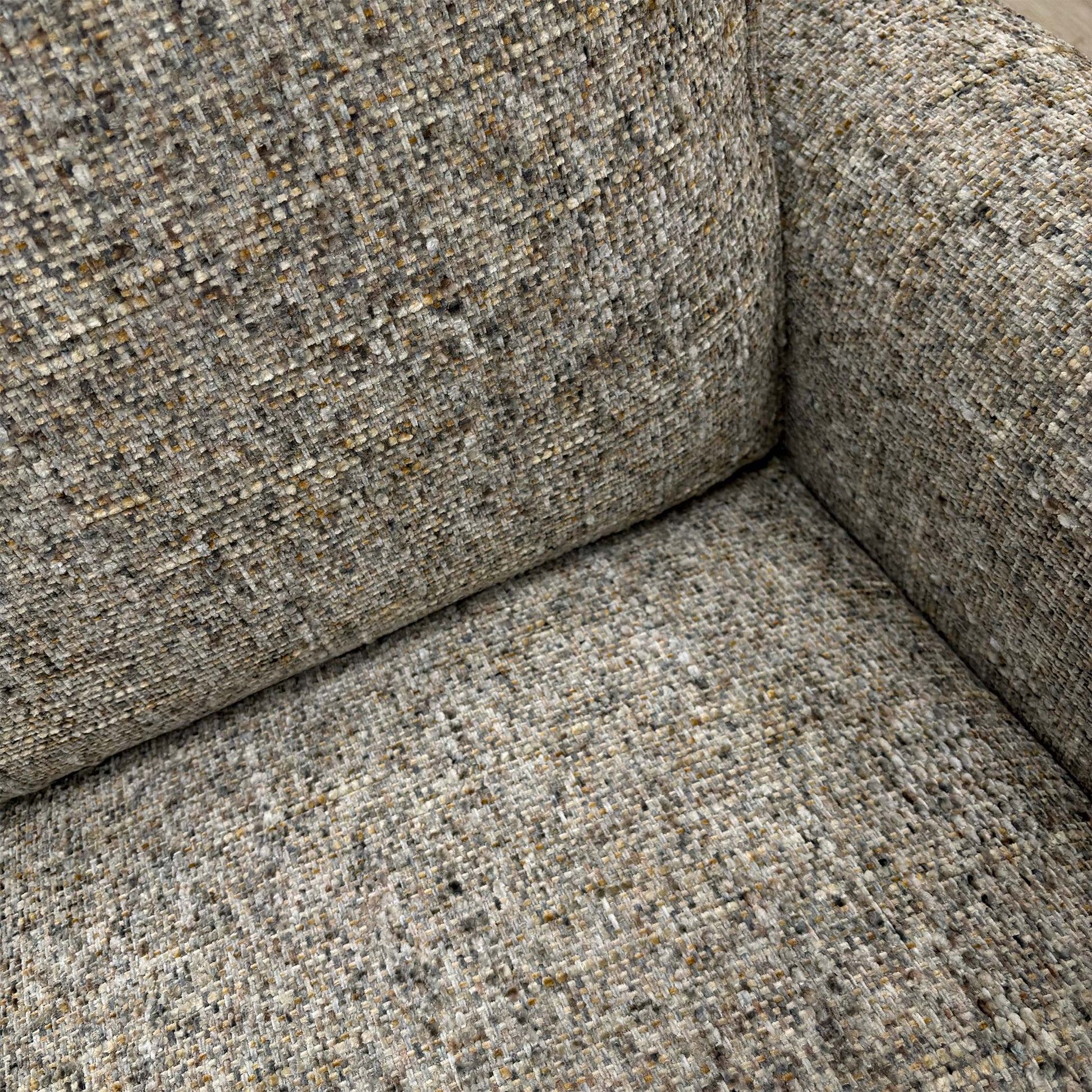 Close-up of the moss grey heather woven fabric, highlighting the textured weave.
