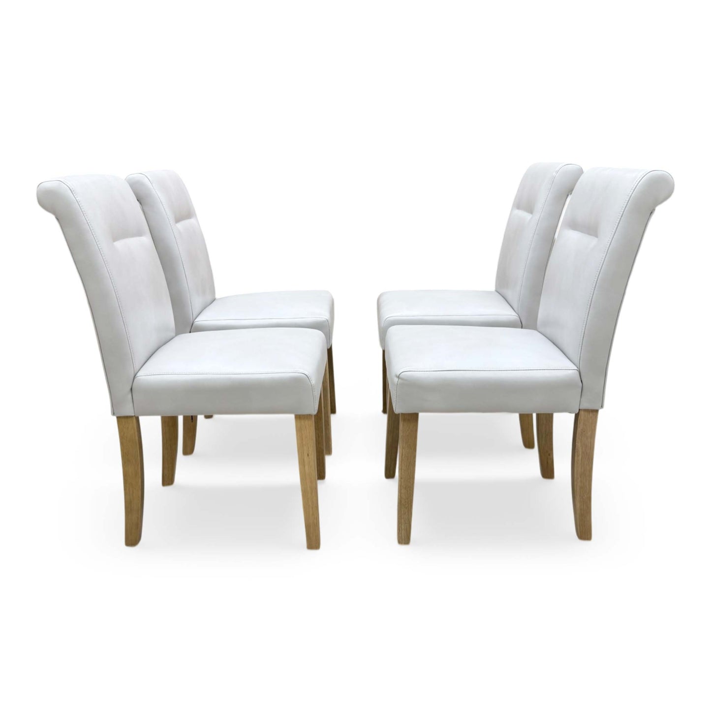Front profile of the Lewis dining chair in light grey faux leather with elegant button tufting and natural rubberwood legs.