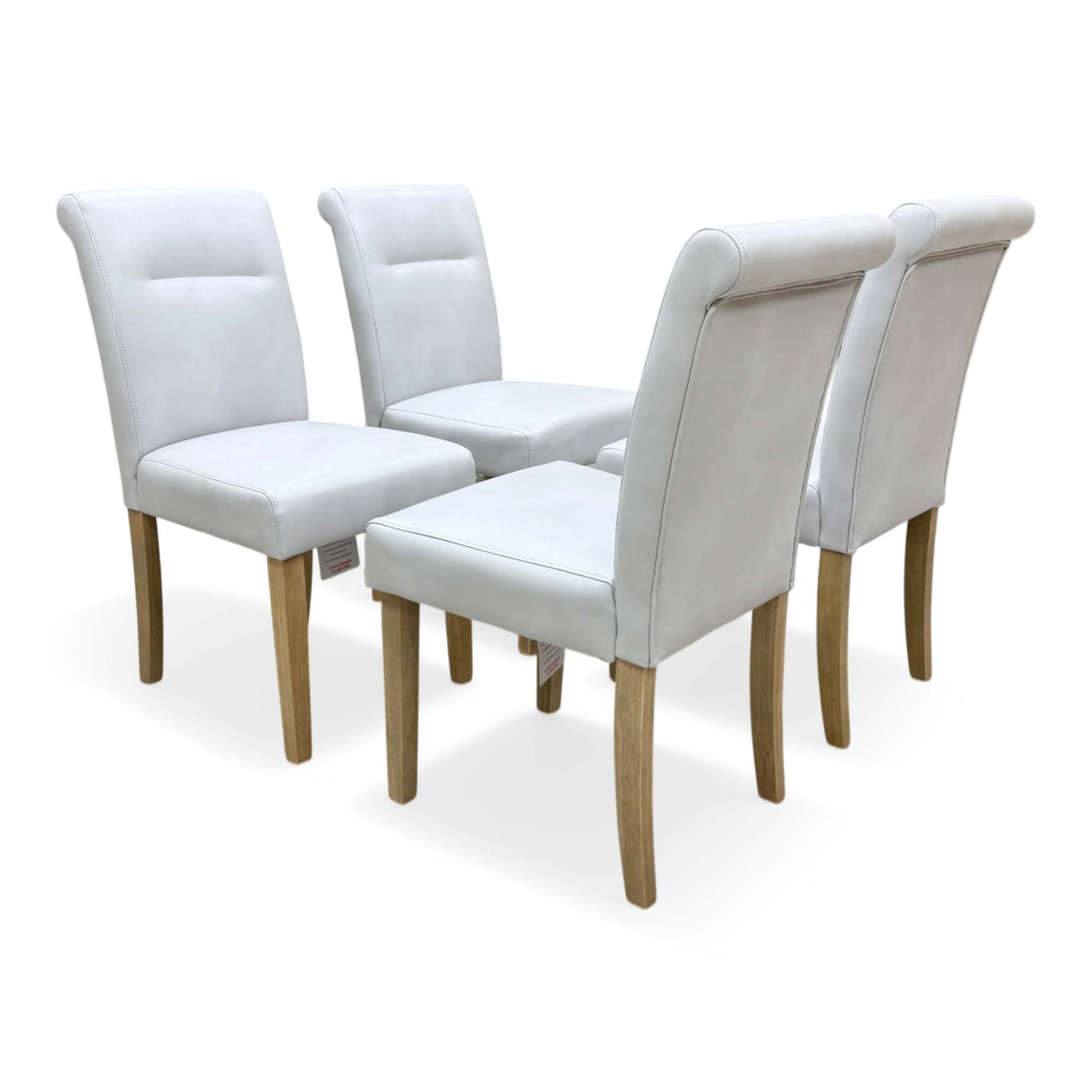Side view of the chair showcasing the continuous roll-back silhouette and sturdy leg construction.