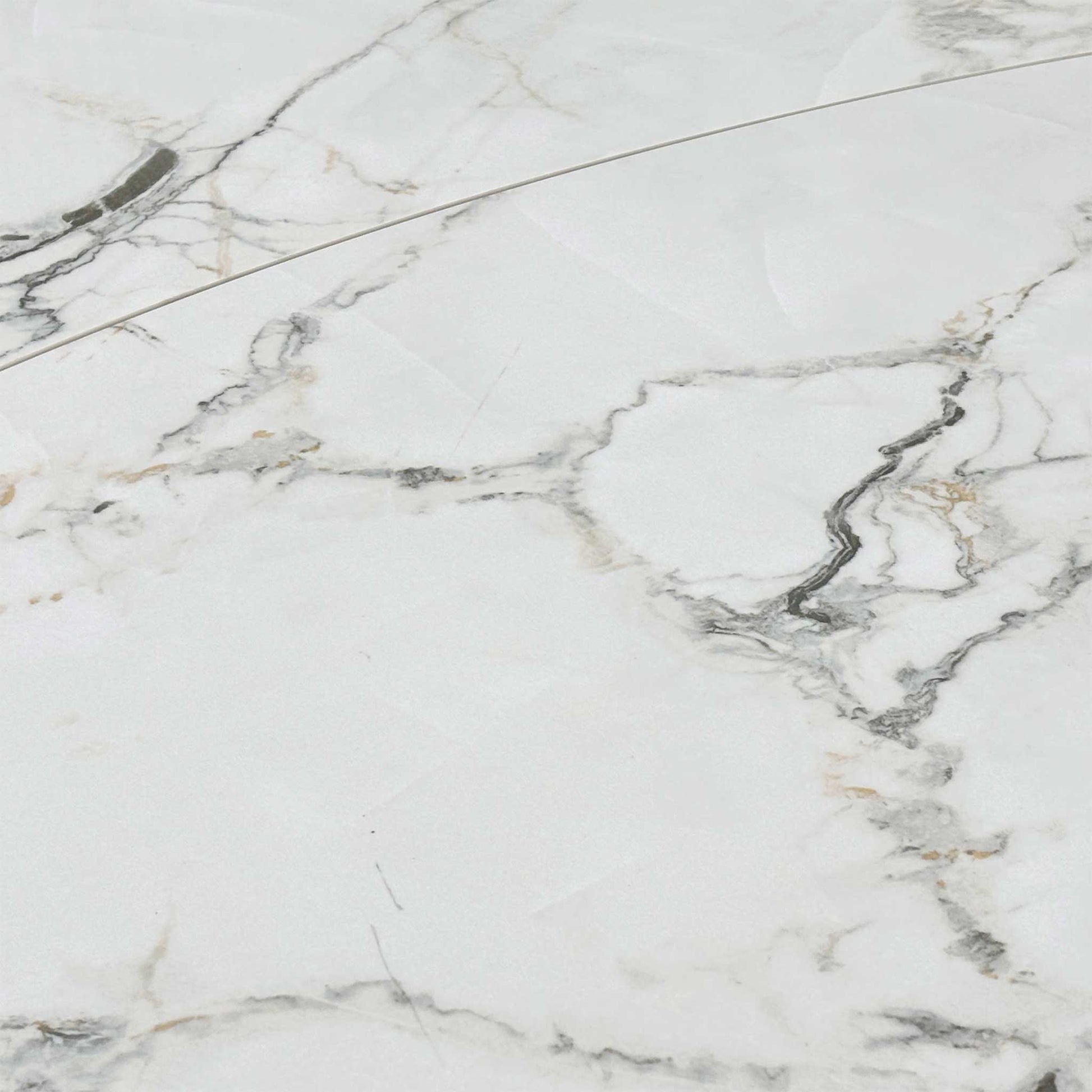 High-definition close-up shot of the white ceramic tabletop, detailing the realistic, intricate grey marble veining pattern and its durable, matte, heat-resistant finish.