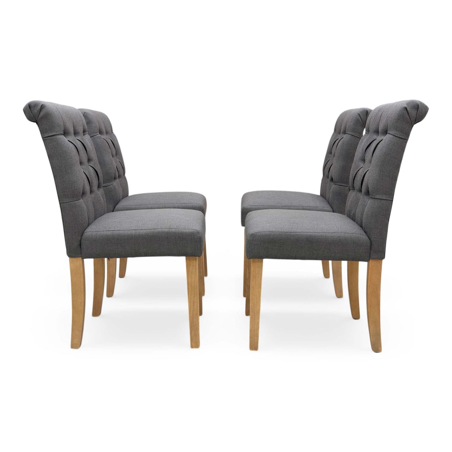 Front view of a single Lewis dining chair, showing the deep-buttoned backrest.