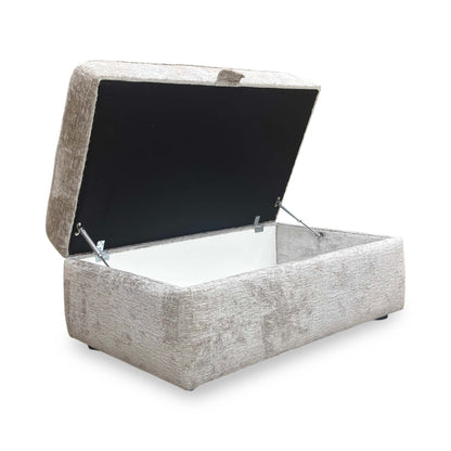 Side view of the Sasha footstool in Ivory White, showcasing the plush padded top and the clean, contemporary tailoring of the fabric.