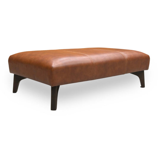 Full view of the ‘Iris’ bench footstool upholstered in Turino Tan brown leather, featuring a classic rectangular design with elegant dark wood tapered legs.