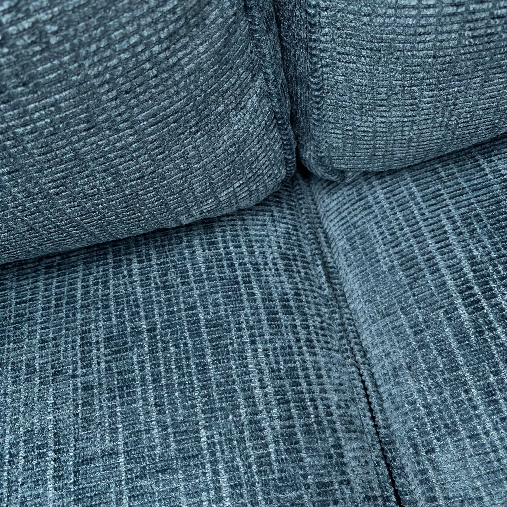 Close-up of the Neptune Blue Bromley chenille fabric, highlighting the rich textured weave and the durable, high-quality finish of the upholstery.