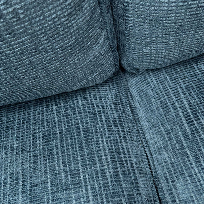 Close-up of the Neptune Blue Bromley chenille fabric, highlighting the rich textured weave and the durable, high-quality finish of the upholstery.