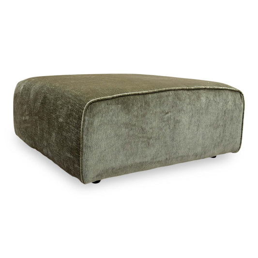 Full view of the ‘Garland’ large square footstool in California Olive Green fabric, featuring a modern low-profile design and a spacious, flat surface.