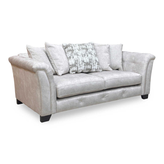 Full view of The ‘Aura’ 3-seater sofa in Kenzo Cream velvet, featuring a relaxed scatter back design and elegant dark wood feet.