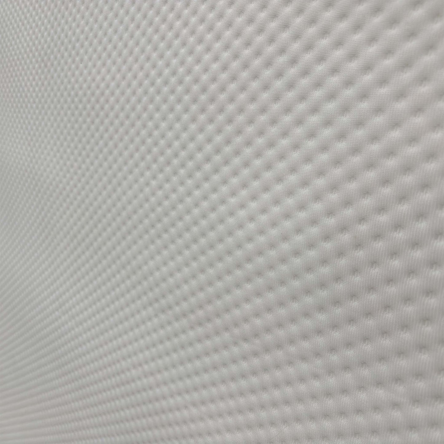 Close-up of the hypoallergenic top fabric, highlighting the breathable knit texture designed for optimal air circulation and temperature regulation.