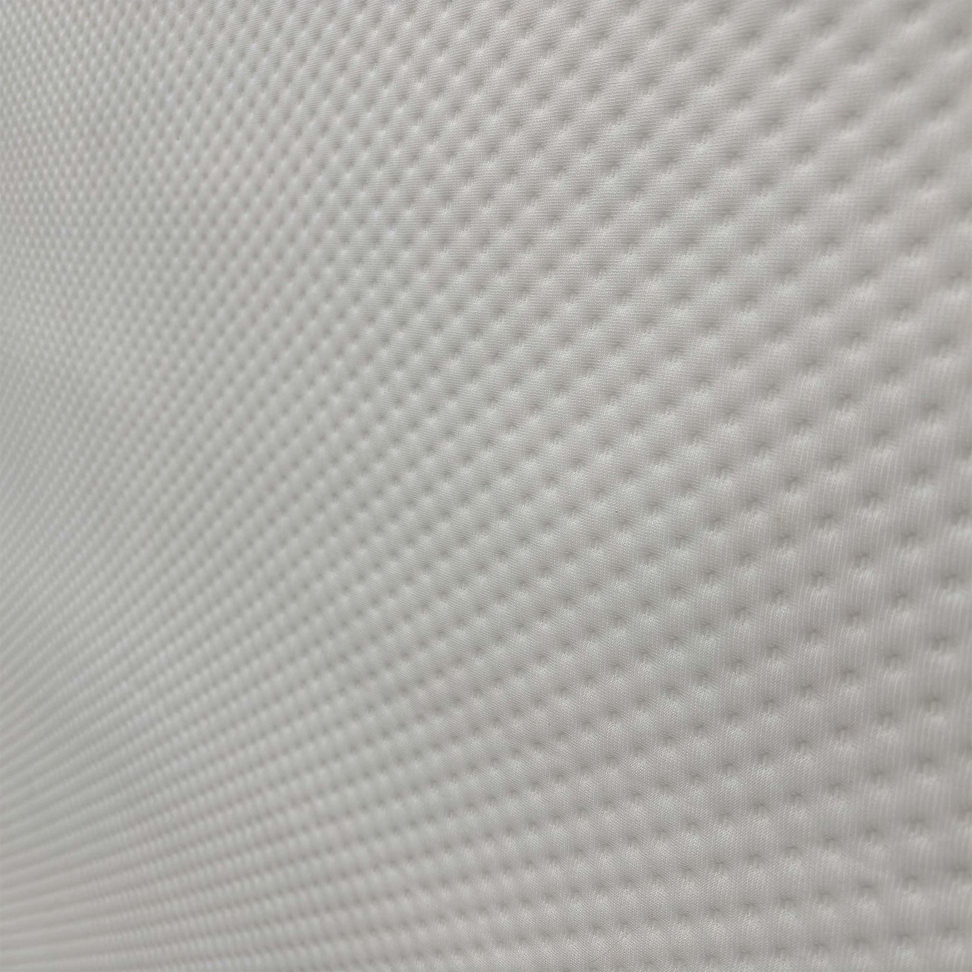 Close-up of the hypoallergenic top fabric, highlighting the breathable knit texture designed for optimal air circulation and temperature regulation.