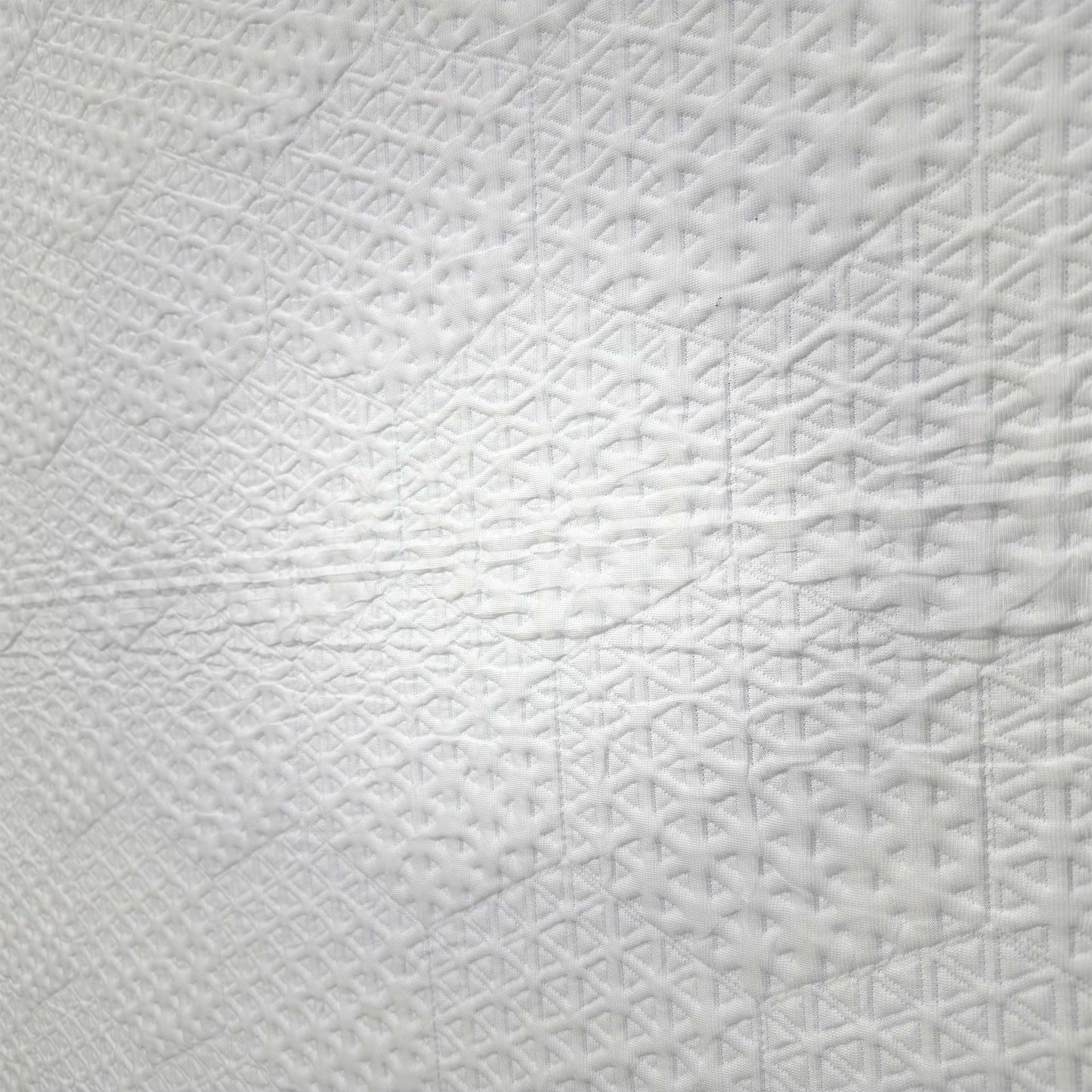 Close-up of the PolarLuxe™ top fabric, highlighting the textured weave and the zipper for the removable, washable cover.