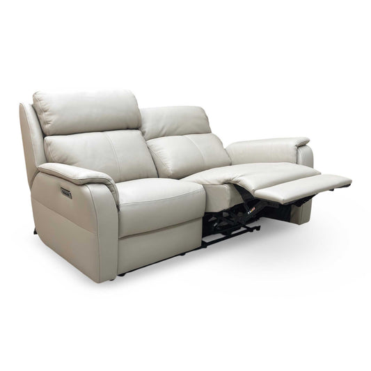 Full view of The ‘Nicoletti Vito’ 2-seater power recliner sofa in Torelo Fango Cream premium leather, featuring a sophisticated modern design and sleek metal feet.