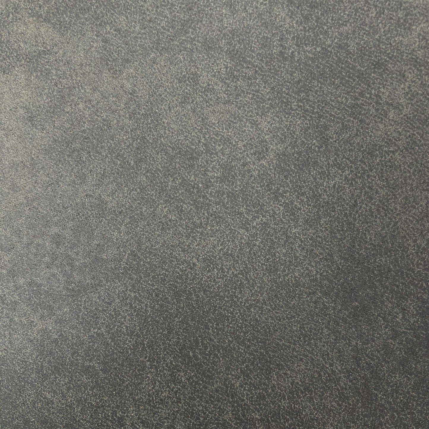 Close-up of the grey fabric and quilted diamond stitching on the backrest, highlighting the quality craftsmanship and tactile finish.