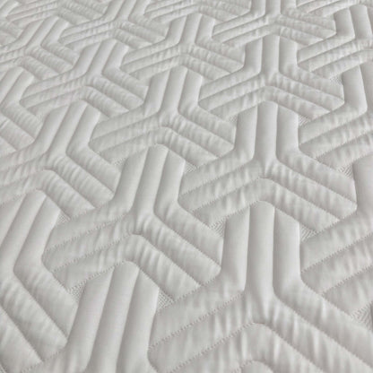 Close up view of the mattress edge, showing the 26cm depth and the durable fabric side panels designed for edge-to-edge support and longevity.