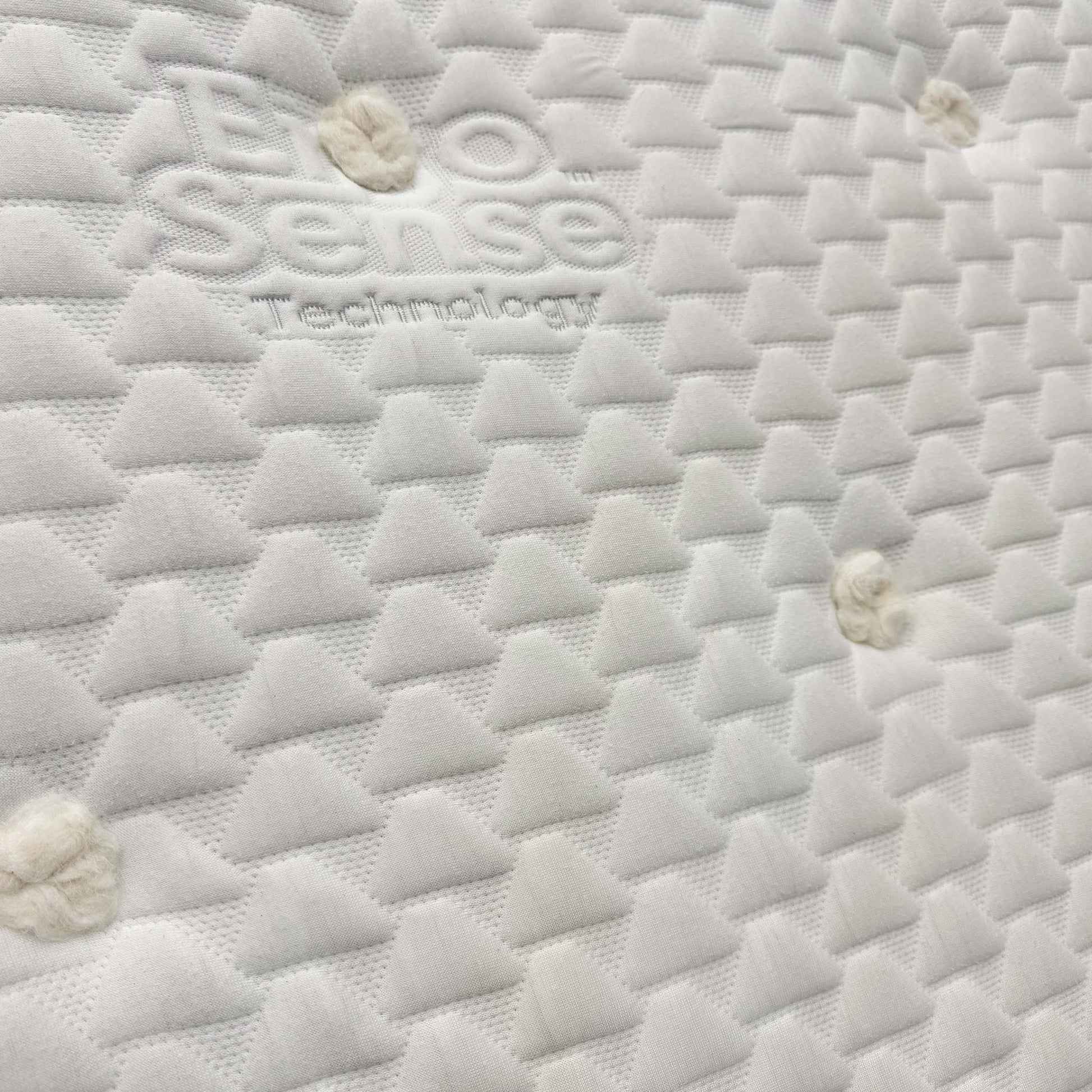 Detail shot showing the medical-grade foam layer and high-quality finish of the UK-made Sleep Story mattress.