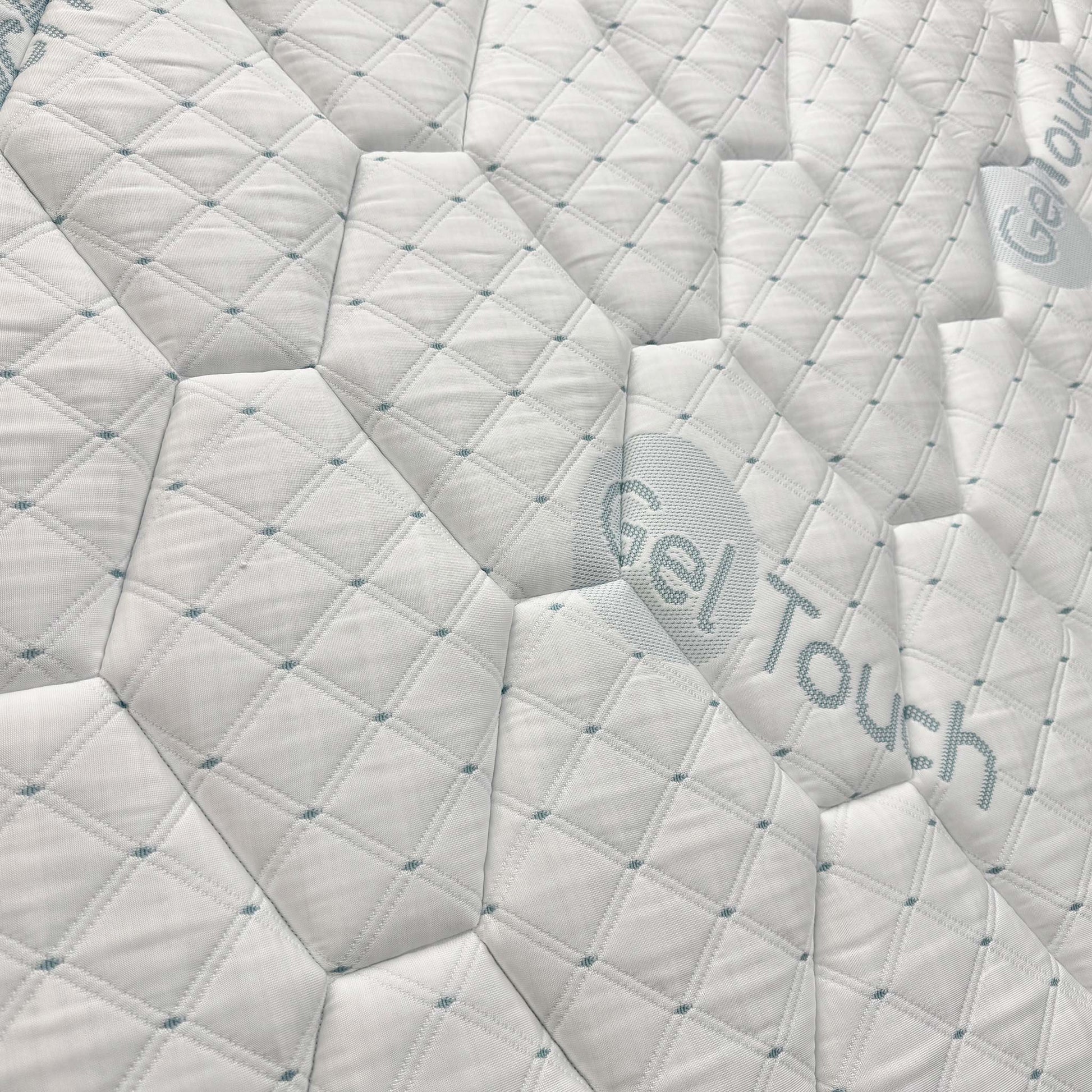 View of the mattress on a bed frame, demonstrating its generous Super King size and medium-firm profile.