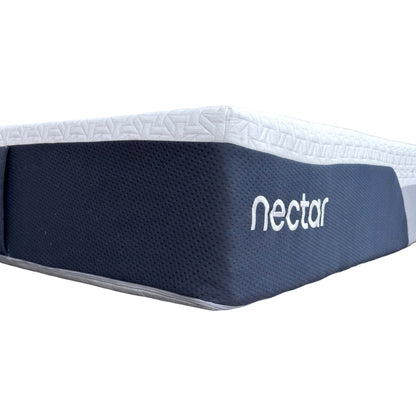 Close-up of the Nectar branding on the mattress corner, showcasing the premium stitching and the 29cm depth of the hybrid memory foam and spring layers.