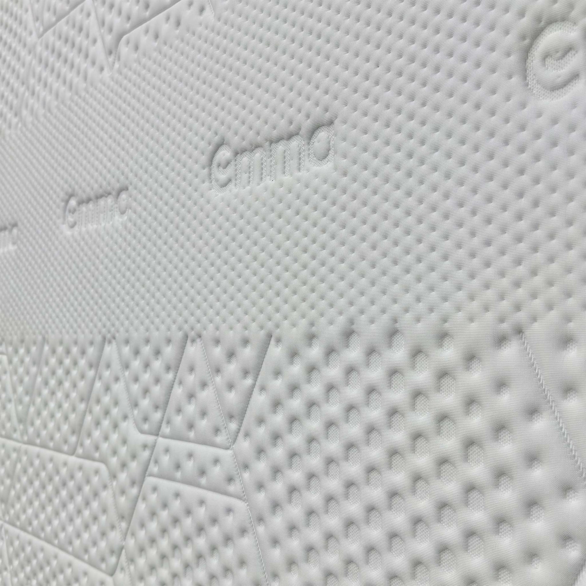 Close-up of the Diamond Degree cooling foam, emphasizing the graphite particles that work to maintain the ideal core body temperature for deep sleep.