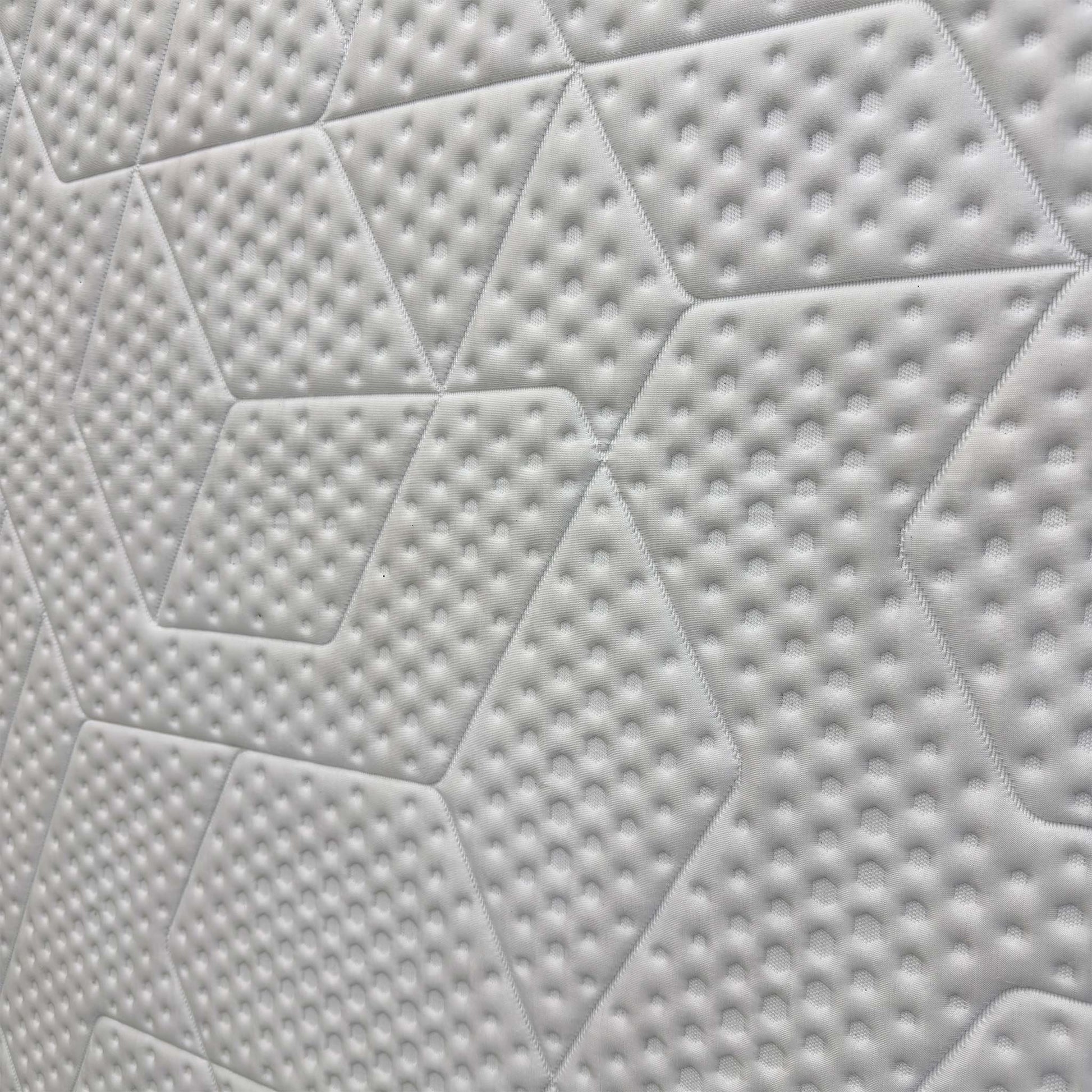 Close-up of the Diamond Degree cooling foam layer, emphasizing the graphite particles that dissipate excess body heat for a deeper, cooler sleep.