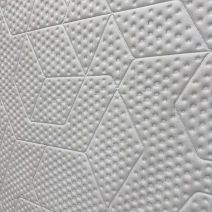 Close-up of the Diamond Degree cooling foam layer, emphasizing the graphite particles that dissipate excess body heat for a deeper, cooler sleep.