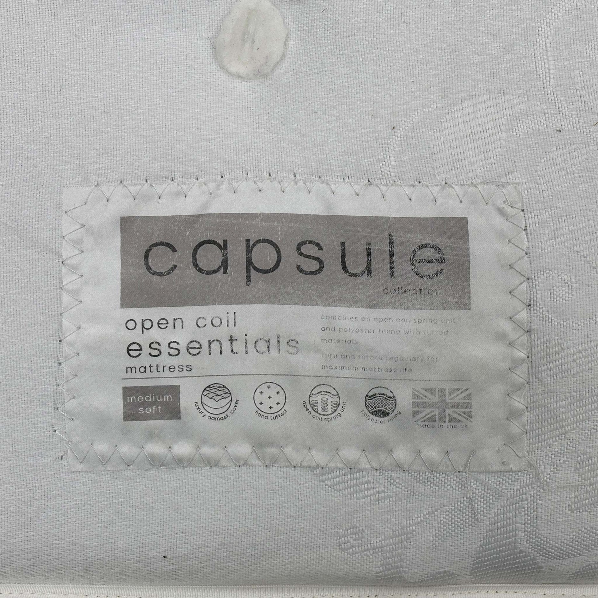 Detail shot of the mattress edge and corner, highlighting the reinforced rod-edge support that helps the mattress maintain its shape over time.