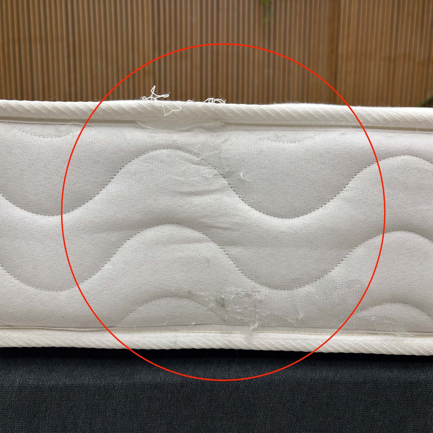 Side profile of the mattress, showing the vertical stitch border and the 20cm depth, making it an ideal choice for bunk beds or guest rooms.