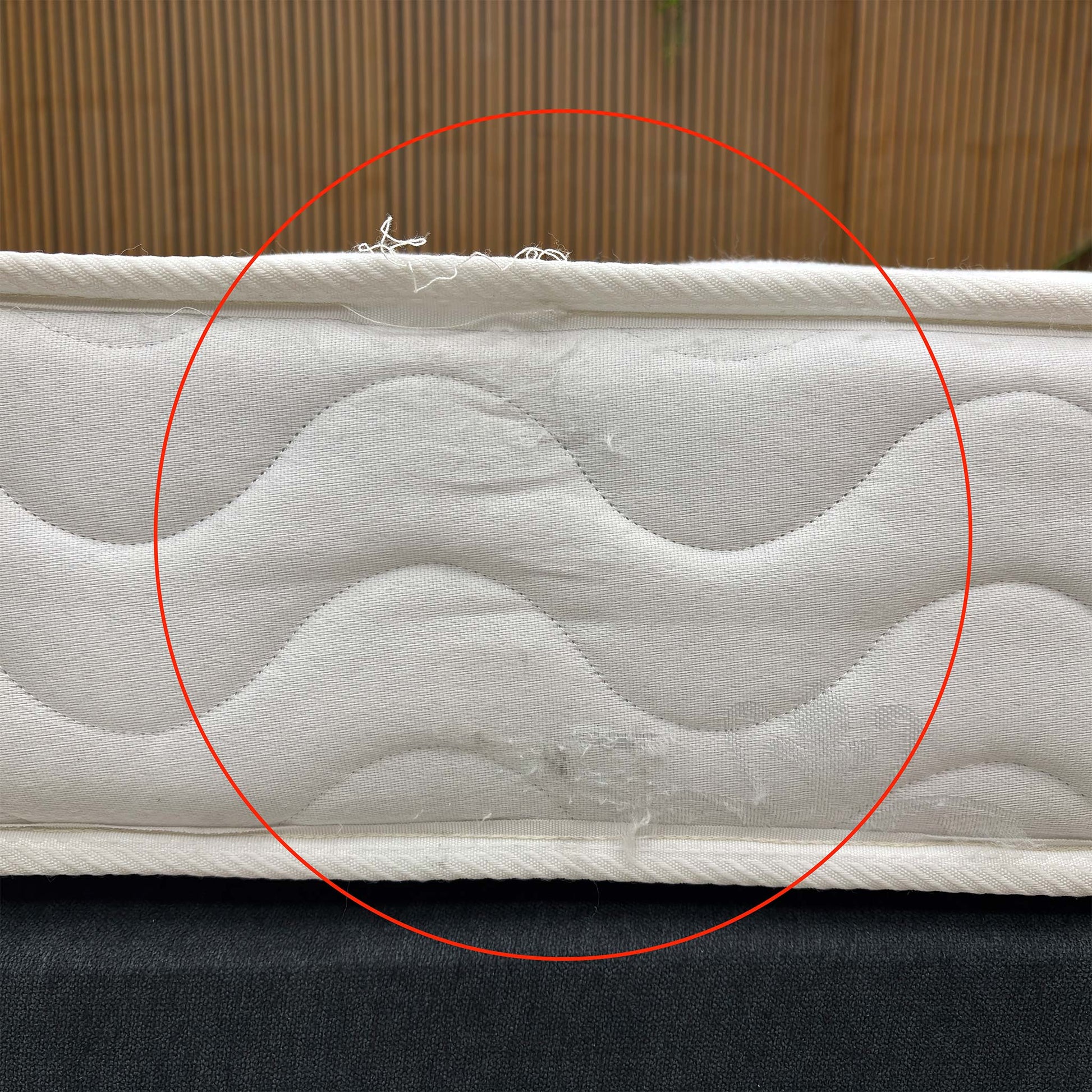 Side profile of the mattress, showing the vertical stitch border and the 20cm depth, making it an ideal choice for bunk beds or guest rooms.