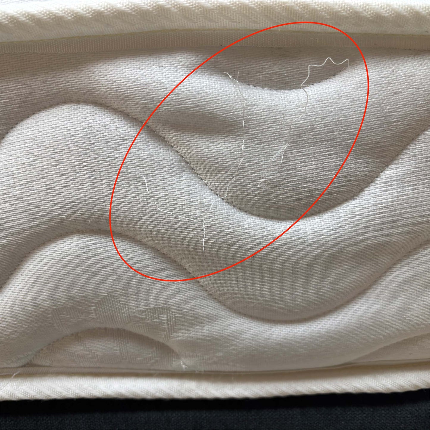 Side profile of the mattress, showing the vertical stitch border and the 20cm depth, making it an ideal choice for bunk beds or guest rooms.