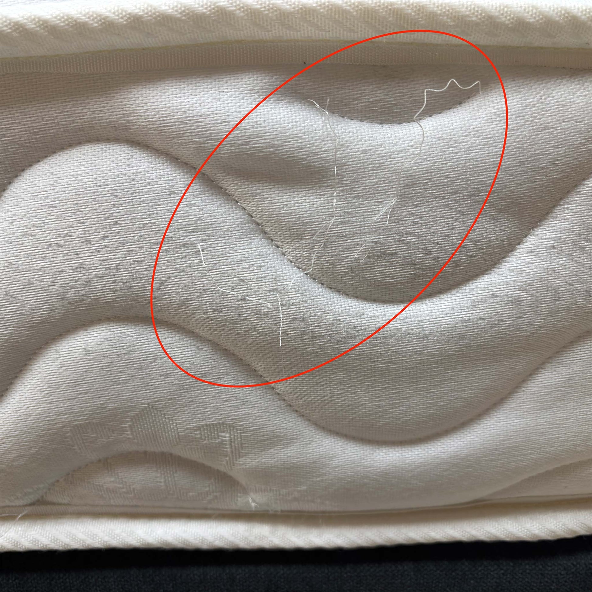 Side profile of the mattress, showing the vertical stitch border and the 20cm depth, making it an ideal choice for bunk beds or guest rooms.