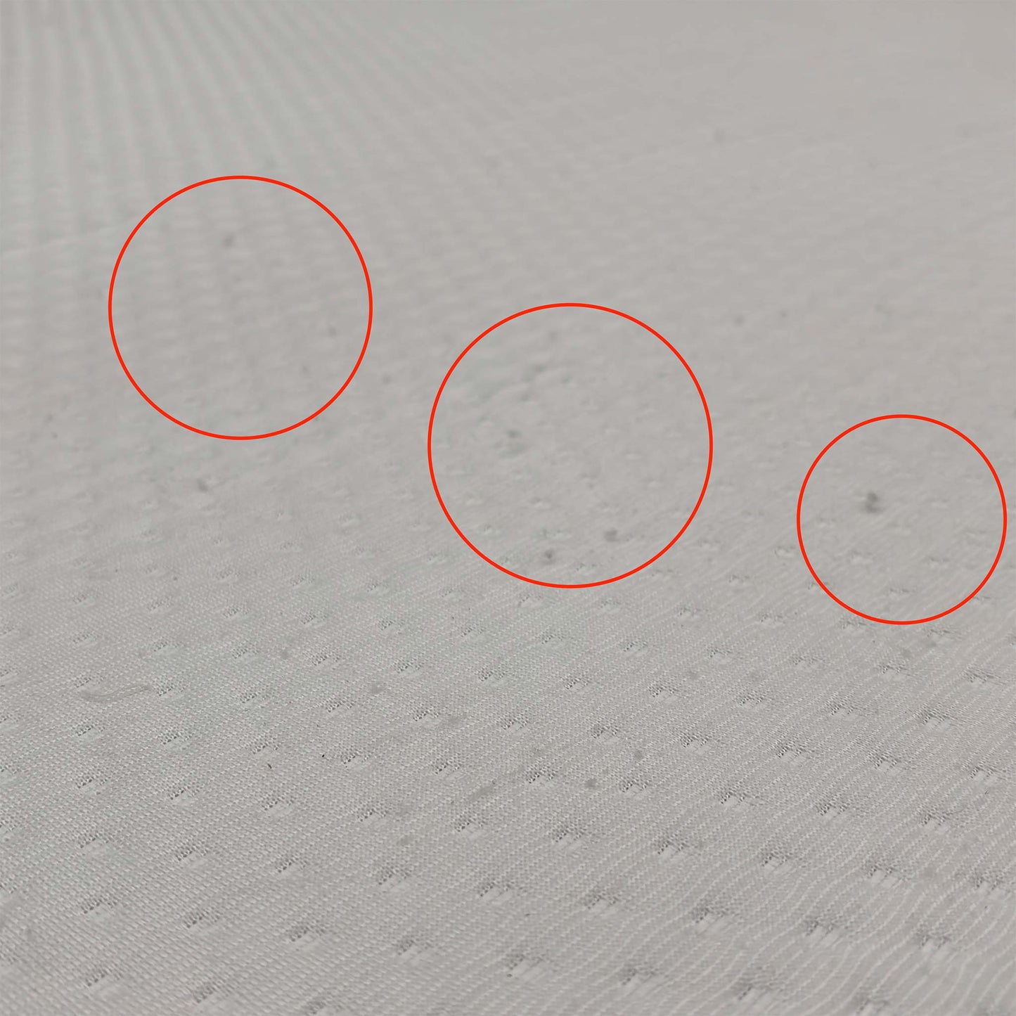 Detail shot of the breathable Ultra-Dry top cover, emphasizing the moisture-wicking properties designed to keep you cool and dry throughout the night.