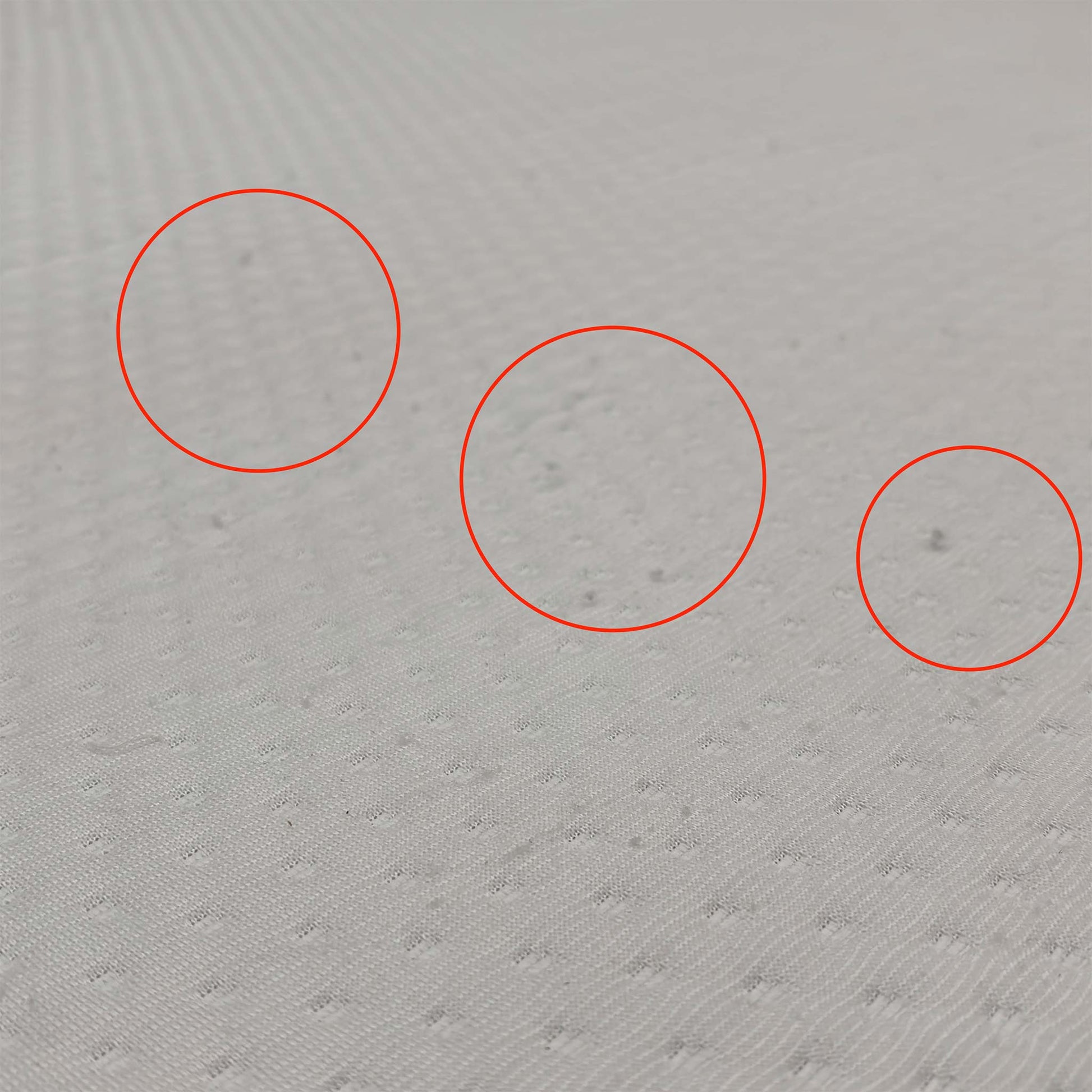 Detail shot of the breathable Ultra-Dry top cover, emphasizing the moisture-wicking properties designed to keep you cool and dry throughout the night.