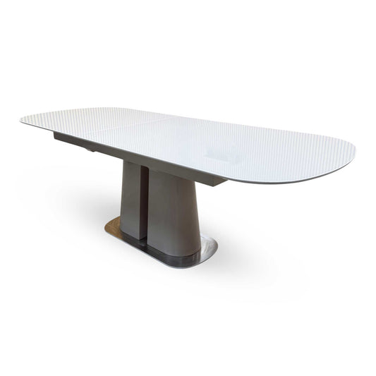 Full view of the Cashmere extending dining table, showcasing its sleek 180cm rectangular tabletop with an elegant cashmere-toned finish and clean, modern lines.