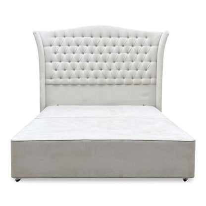 Front view look of the king-size upholstered headboard, showing the deep buttoned or clean stitched detailing, structural wing side profiles, and premium tailored finish.