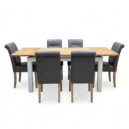 'Lewis' Solid Oak 120cm Large Draw Leaf Extending Dining Table with Dark Grey Faux Leather Roll Back Dining Chairs - Set of 6