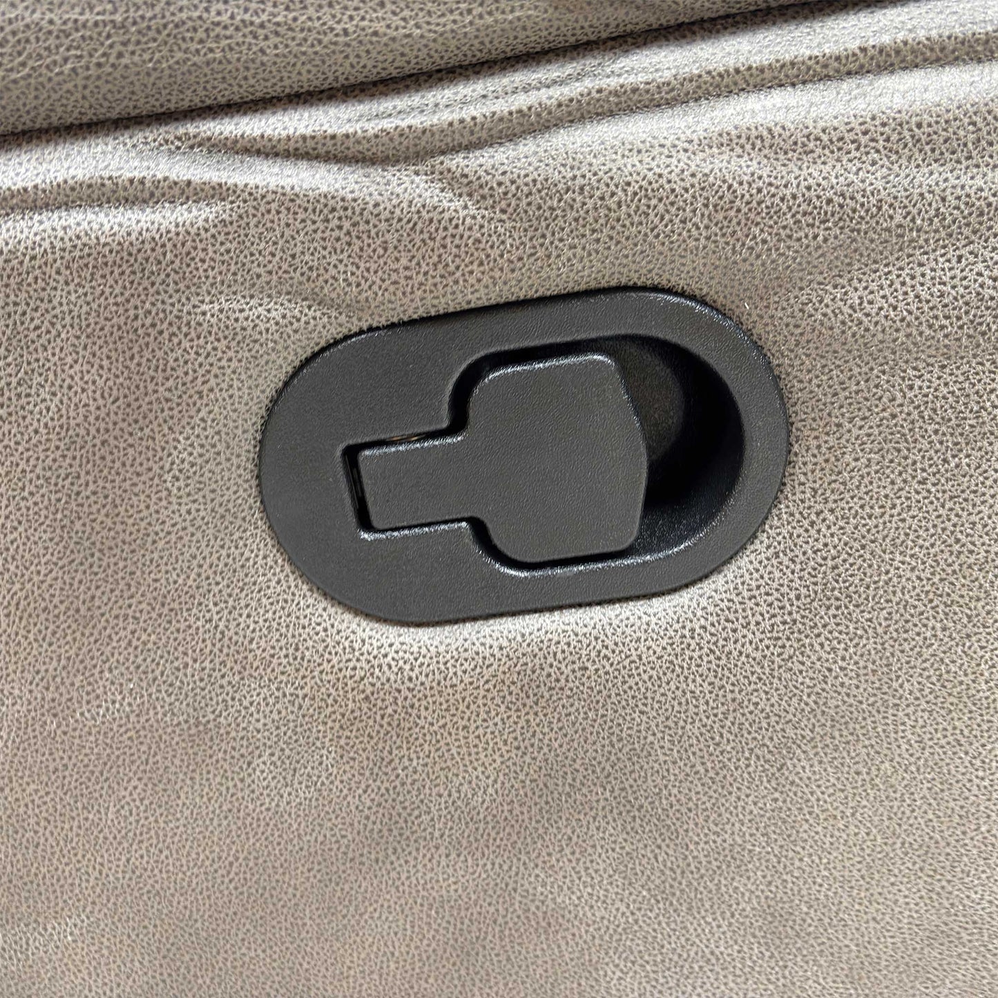 Low-angle view of the base, showcasing the sturdy integrated metal reclining mechanism and stable foundation.