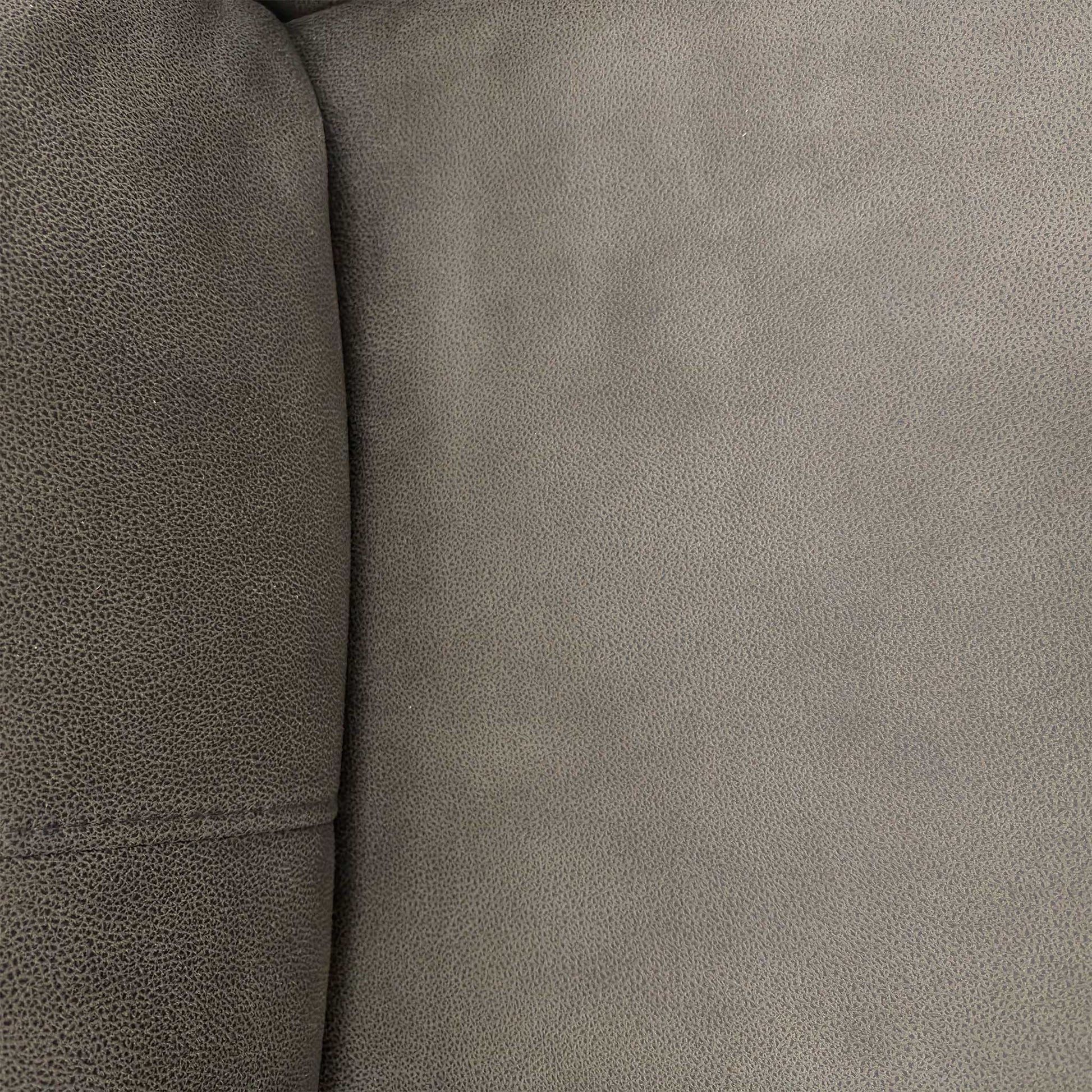 Close-up of the Steel grey suede-effect fabric, highlighting the brushed finish and high-quality stitching details.