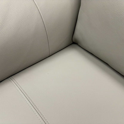 High-angle view of the seat cushions and headrests, highlighting the ergonomic stitching and plush padding.
