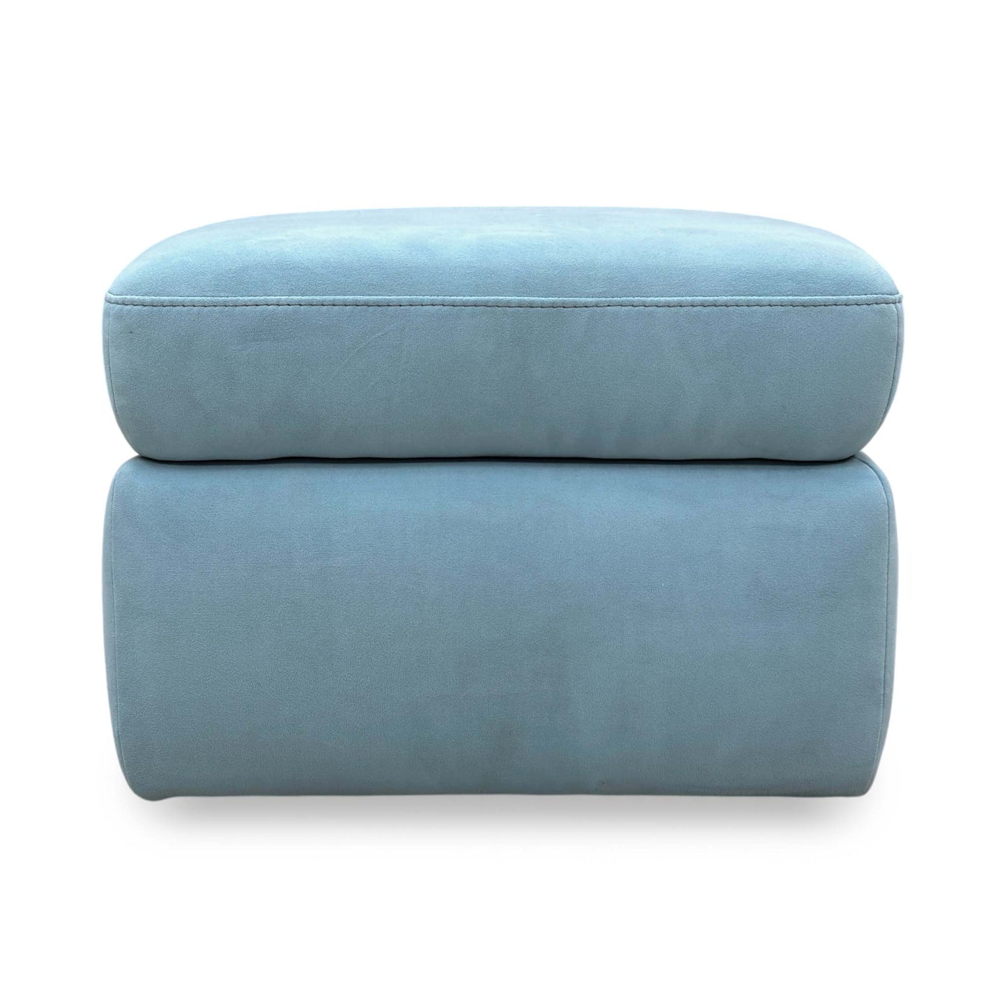 Front view of the baby blue velvet footstool, showcasing the smooth fabric finish and low-profile modern aesthetic.