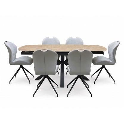Front view of the Raul ceramic top dining table closed to 160cm with six stone grey fabric swivel chairs
