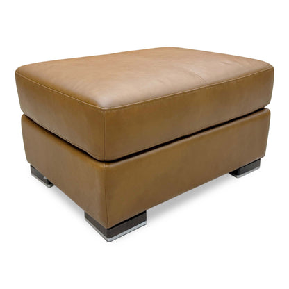 Full view of the Bark Brown leather footstool, showcasing the uniform color and low-profile modern aesthetic.