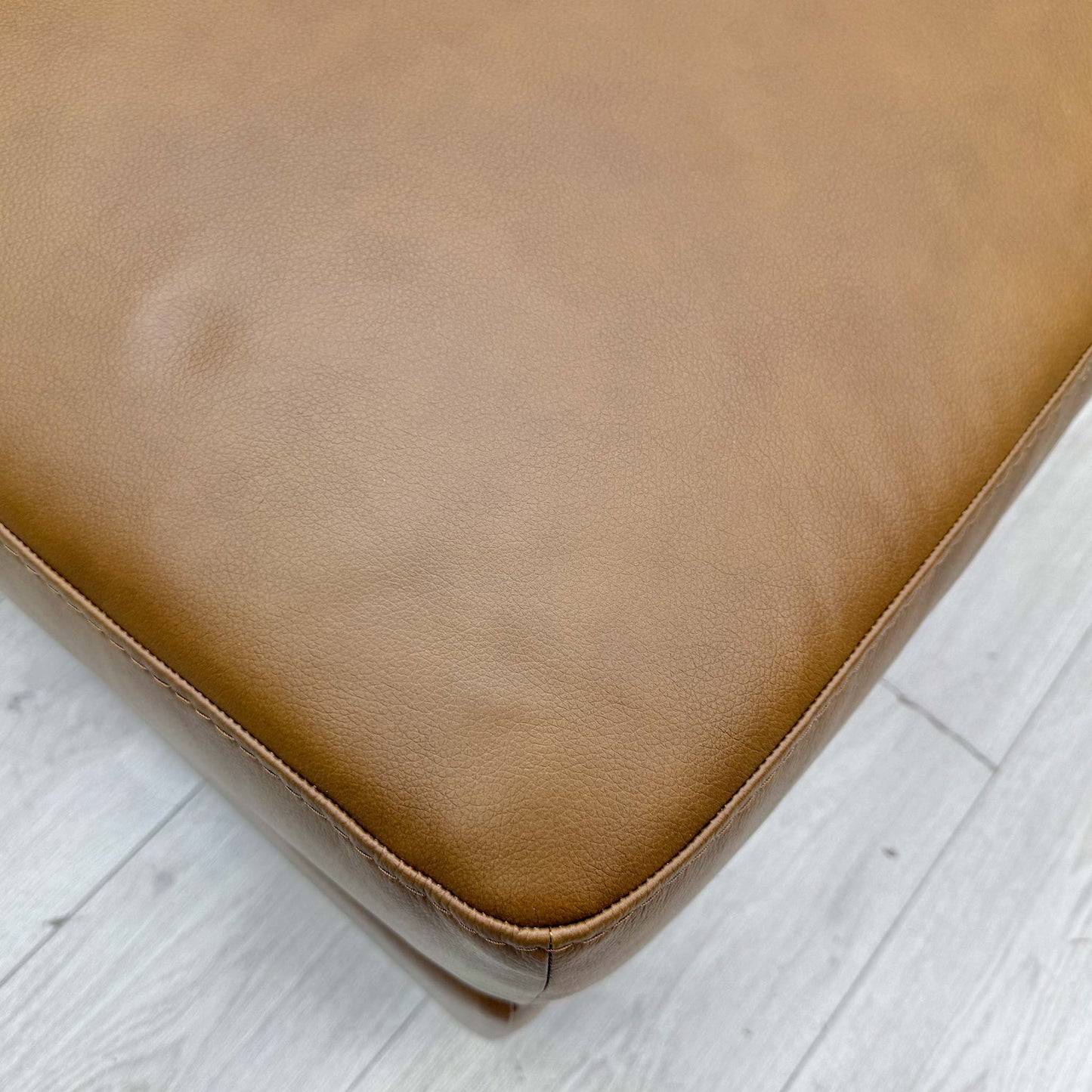 Close-up of the Bark Brown (2877) leather, highlighting the natural grain texture and rich, earthy brown color tone.