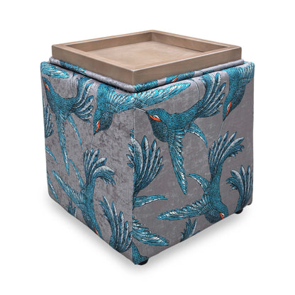 Side profile of the cube footstool, emphasizing the consistent pattern alignment and the clean edges of the upholstery.