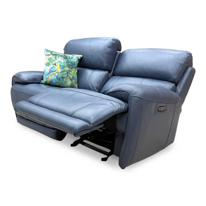 Detailed shot of the integrated power reclining controls and USB charging port located on the outer side of the armrest.