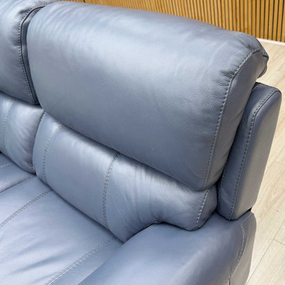 Close-up of the premium Ocean Blue leather, emphasizing the smooth texture and the rich, deep blue color saturation.
