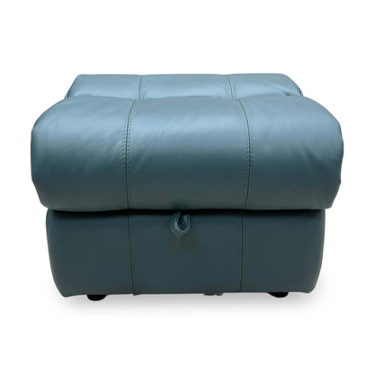 Front view of the Lake Green leather footstool, showcasing the rich color and modern, low-profile aesthetic.