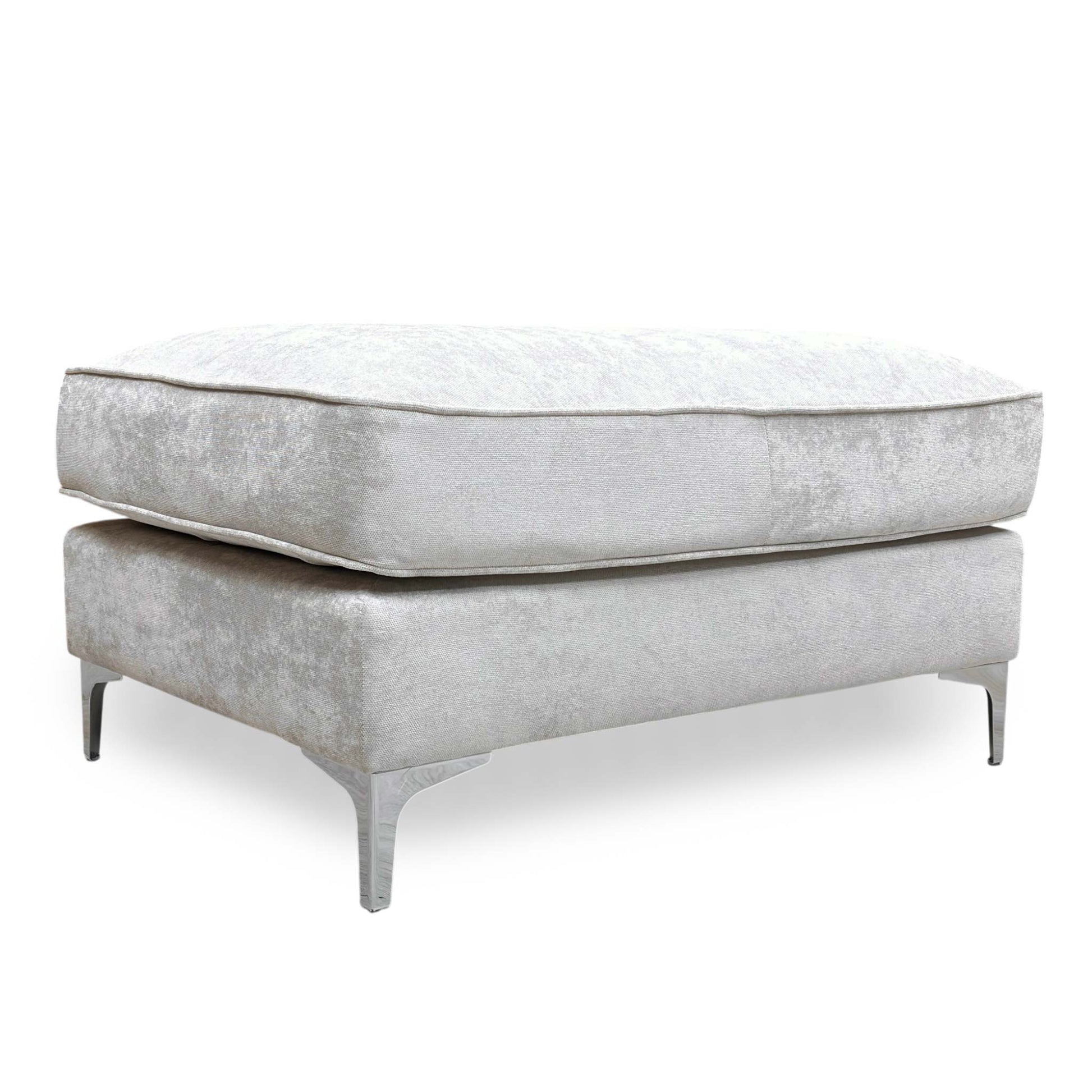 Full view of a rectangular Legend 'Kingston' footstool upholstered in silver fabric, featuring a deeply buttoned tufted top and dark wooden legs.
