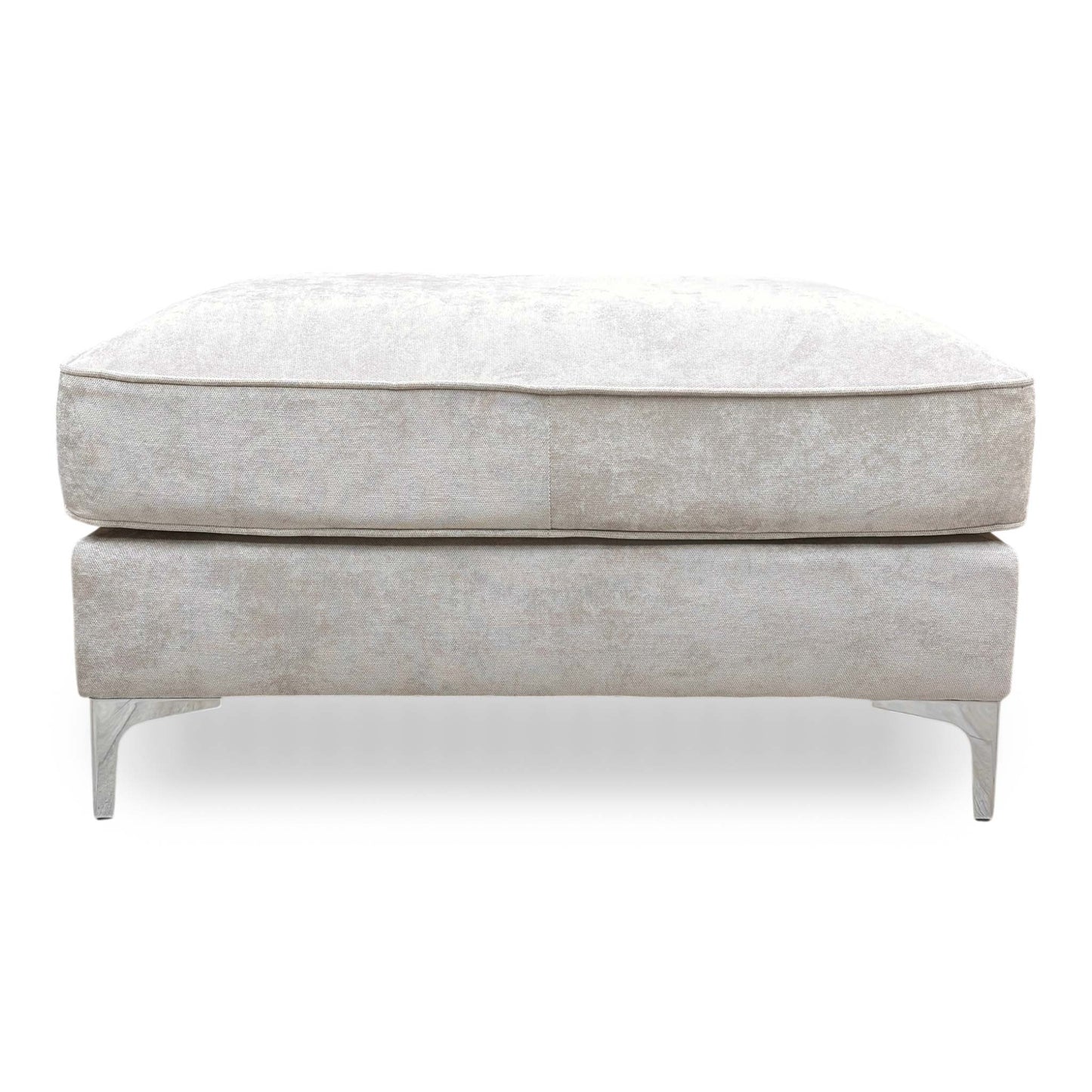 Front view of the silver fabric footstool, showcasing the classic Chesterfield-style tufting and structured rectangular shape.